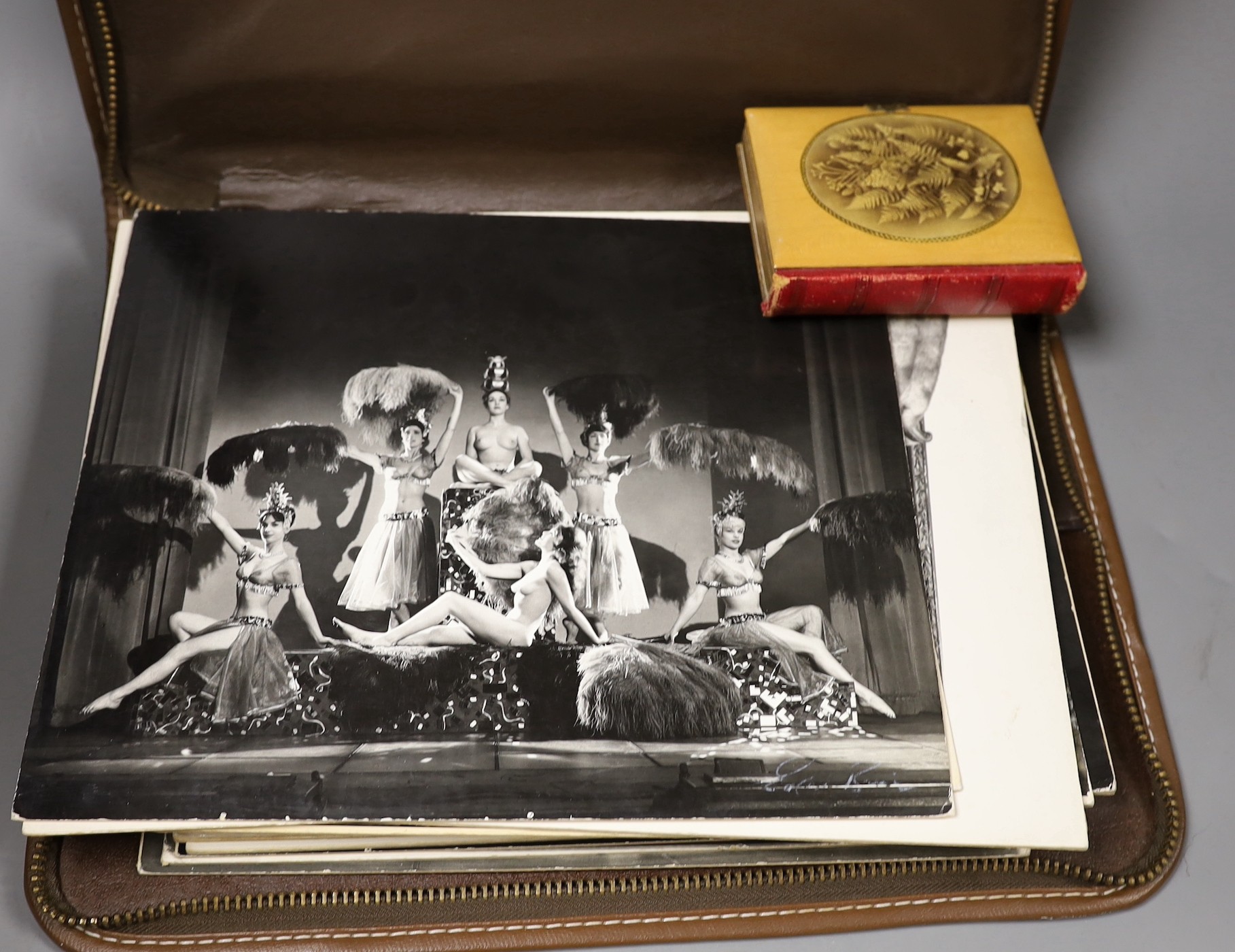 A collection of black and white 1960’s photos from the Windmill Theatre, London, some signed by the photographer together with a Mauchline ware album containing photos of Sussex